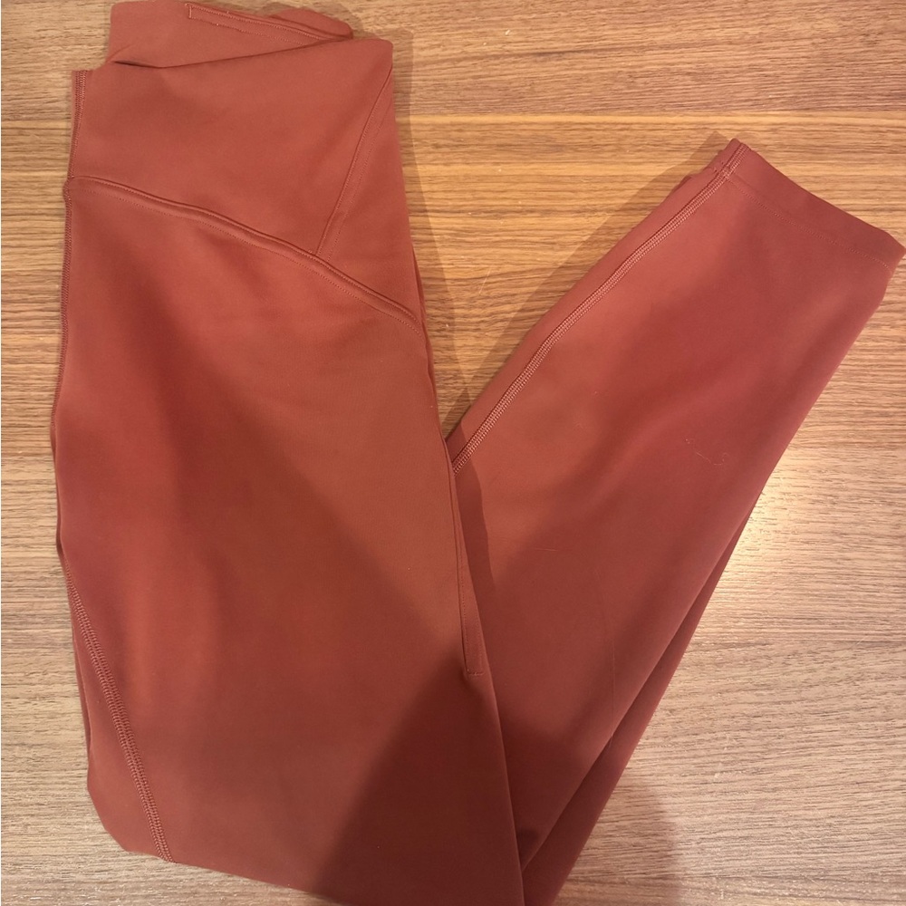 Lululemon instill 25” Rust Orange Leggings size 8